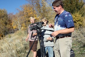 Showing my junior high students how to use the Panasonic camera to film the parallax activity.