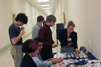 High School students getting badges
