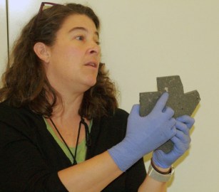 Cari points out dust bunnies